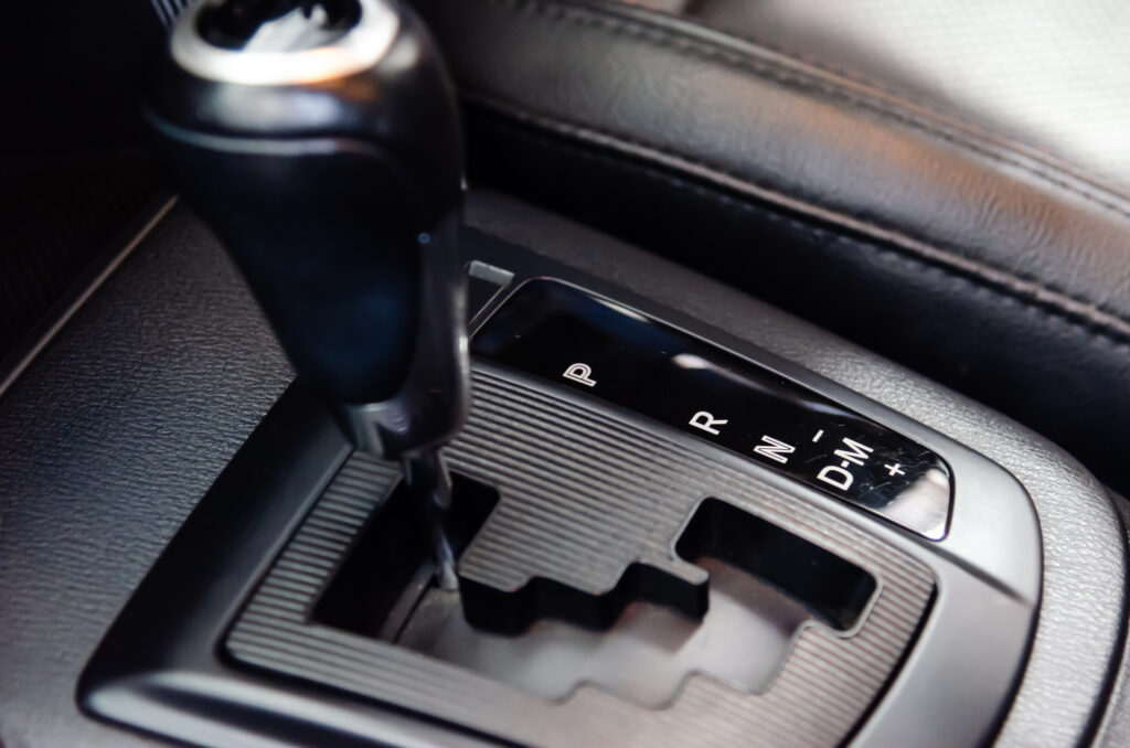 Automatic gear stick inside modern sport car.